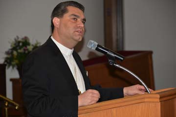 Bishop Gene Savoy Jr. delivering closing remarks PHOTO: Robert Roy