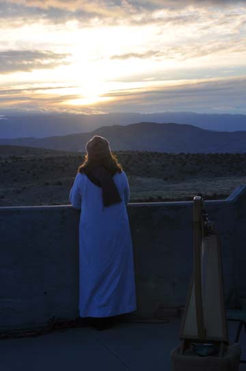 Harpist Elizabeth Reece observing the sunrise sun PHOTO: Stephan Fuelling