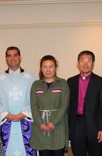 Bishop Gene Savoy Jr, Yukako Kwai, and Bishop Yukinori Matsushita following ceremony of ordination.