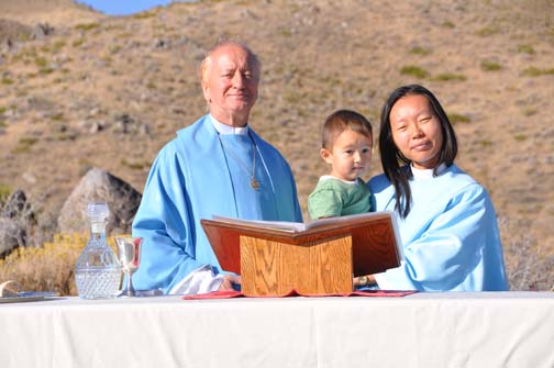 Rob, Joseph, and Noriko Roy at the Church of the End Times in the Red Rock Consecrated Sanctuary after Rob and Noriko performed a ceoncelebratory Communion Service on September 20, 2015 PHOTO: Stephan Fuelling
