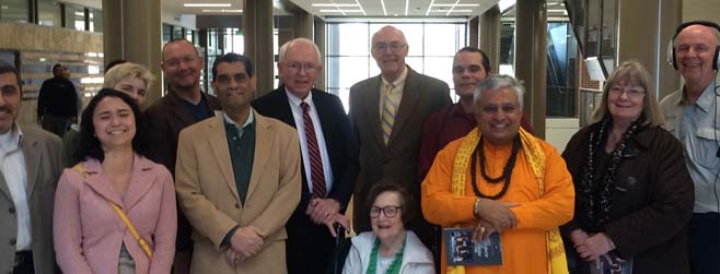 Religious leaders gather with UNR President Dr. Marc A. Johnson to celebrate the opening of university meditation rooms.