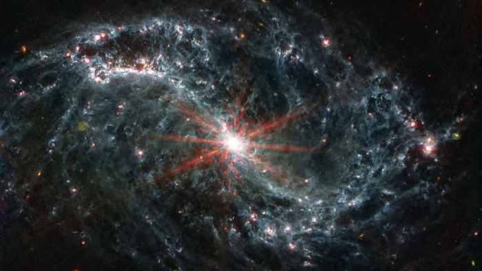 Spiral galaxy through Webb Telescope.